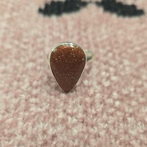 Glistening Brown Teardrop Ring